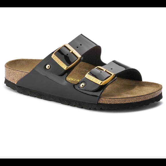 black birkenstocks with gold buckle